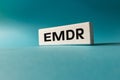 EMDR symbol. Eye Movement Desensitization and Reprocessing. Medical concept. Modern forms of therapy. Text EMDR written on a Royalty Free Stock Photo