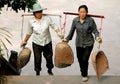 Emeishan, China: Woman with Shoulder Yokes