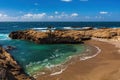 Emerald bay, Point Lobos Nature Preserve, Monterey. Green water with beach rocky cliff blue ocean and sky in background. Royalty Free Stock Photo