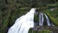 Emerald Cascade: Aerial Majesty of Washington\'s Forest Waterfall