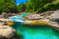 Emerald color Soca river with rocky shore, Bovec, Slovenia
