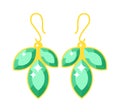 Emerald earrings beautiful gold accessory isolated.