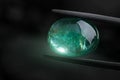 The emerald gemstone green shining. Royalty Free Stock Photo