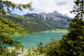 emerald-green alpine lake Haldensee in Austrian Alps of the Tannheim valley or Tannheimer Tal, Tirol, Austria Royalty Free Stock Photo