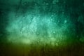 Emerald green concrete background. Grunge dark moody. Textured surface with bright light spots. Horizontal photo for modern design Royalty Free Stock Photo