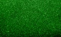 Emerald green, glitter, sparkle and shine abstract background. Excellent backdrop for festive Holiday`s. Royalty Free Stock Photo