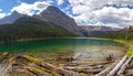 Emerald Green Luellen Lake Scenic Landscape Panorama with Castle Mountain Peak Rising High in the Background Royalty Free Stock Photo