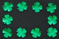 Emerald green paper clover shamrock leafs border frame Royalty Free Stock Photo