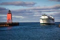 Emerald Isle Car Ferry and Charlevoix Light Royalty Free Stock Photo