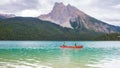 Emerald Lake in Autumn at the Yoho National Park Alberta Canada, men by the Emerald lake Canada Royalty Free Stock Photo