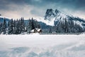 Emerald Lake with wooden lodge and rocky mountains with snow covered on winter at Yoho national park Royalty Free Stock Photo