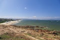 Emerald water and rocky coast of the South China Sea near the resort of Da Nang, Central Vietnam, rocky coast bathed by a Royalty Free Stock Photo