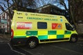 Emergency ambulance with advice signs on side panels