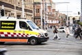 New South Wales Emergency Ambulance on George Street Haymarket Chinatown.The image was taken in panning shot.
