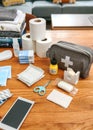 Emergency backpack equipment with first aid kit organized on the table Royalty Free Stock Photo