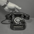 Emergency. black and white. Hand picks up the phone. old telephone set. square format Royalty Free Stock Photo