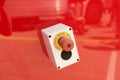 Emergency button on red background Royalty Free Stock Photo