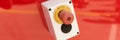 Emergency button on red background Royalty Free Stock Photo
