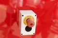 Emergency button on red background Royalty Free Stock Photo