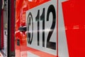 Emergency call 112 on an ambulance Royalty Free Stock Photo