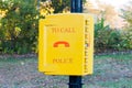 Emergency call police yellow box in a New-York city park