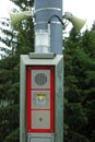 Emergency call station with megaphones in forest