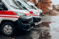 Emergency car, red and white ambulance medical service vehicle on a street in big city