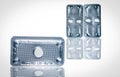 Emergency contraceptive pills in blister pack on blurred background of morning after pills. Drug cause of ectopic pregnancy. Royalty Free Stock Photo