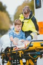 Emergency doctor giving oxygen to accident victim Royalty Free Stock Photo