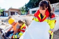 Emergency doctors giving first aid to construction worker Royalty Free Stock Photo