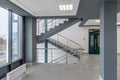 emergency and evacuation exit stairs in up ladder in new empty office building Royalty Free Stock Photo