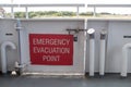 Emergency Evacuation Point danger information and safety sign Royalty Free Stock Photo
