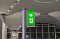 Emergency exit door sign board. green color. Royalty Free Stock Photo