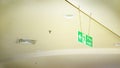 Emergency exit,fire alarm,Fire exit sign and in the blurred background Fire Sprinkler Life Safety. Royalty Free Stock Photo