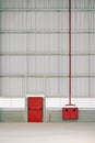 Emergency exit and fire hydrant on an industrial installation Royalty Free Stock Photo