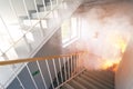 Emergency exit and fire on staircase Royalty Free Stock Photo