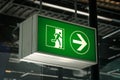 Emergency Exit sign on airport closeup Royalty Free Stock Photo