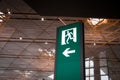 Emergency exit sign at airport Royalty Free Stock Photo