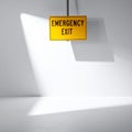 Emergency Exit Sign in a Dramatic Beam of Light Royalty Free Stock Photo