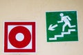 Emergency exit signs green and red