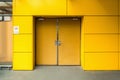 Emergency fire exit door and aluminum composite wall of warehouse Royalty Free Stock Photo