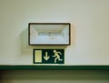 Emergency Fire Exit Light Sign above door Royalty Free Stock Photo