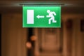 Emergency Fire exit sign at the corridor in building Royalty Free Stock Photo