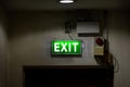 Emergency fire exit sign show the way to escape Royalty Free Stock Photo