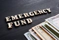 Emergency fund from wooden letters.