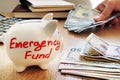 Emergency fund written on a piggy bank. Royalty Free Stock Photo