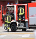 Emergency Italian firefighters with uniforms with the word meani