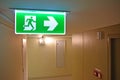 Emergency light and Emergency Fire exit sign at  the corridor Royalty Free Stock Photo
