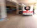 Emergency medical staff team transporting patient to hospital with ambulance into an Accident & Emergency ward of a hospital. EMS. Royalty Free Stock Photo