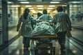 Emergency Medical Team Rushing Patient Through Hospital. Royalty Free Stock Photo